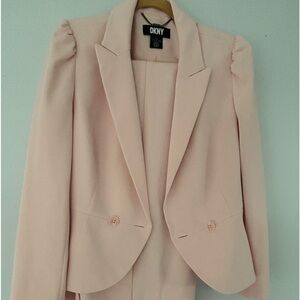 A set of pant and blazer light pink